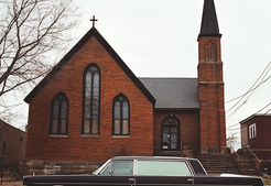 smulloni_a_Lincoln_hearse_parked_outside_a_Lutheran_church_on_d59e99a4-1b99-4d8f-8997-643b86f39992_3